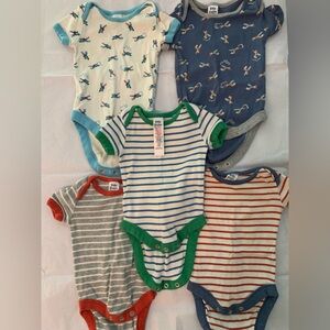 Baby Boden newborn onesies, stripes and airplane pattern. Five total